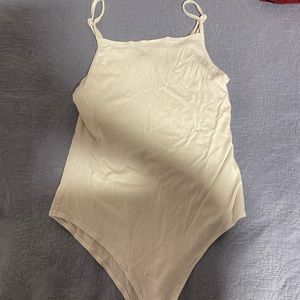 this is a very cute white onesie. it’s good to wear for almost everything